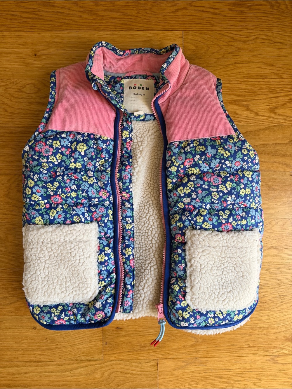 Mini Boden Floral Puffer Vest in Pink and Navy with Sherpa Pockets
